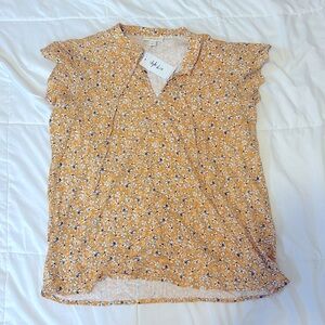 Yellow blouse with ruffle sleeve